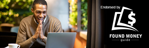 happy man with laptop endorsed by found money guide