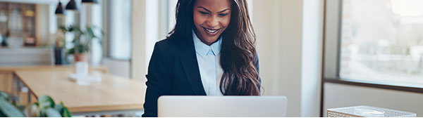 Woman using laptop.